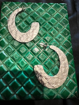 Steel earrings new, silver color