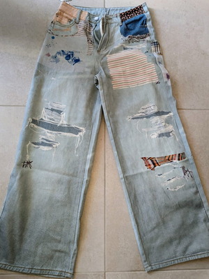 Jean wide leg pants new, ripped design, size M