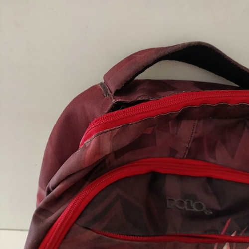 Polo school backpack used, slightly frayed at the top