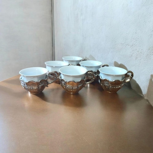 Porcelain coffee cups with silver bases like new