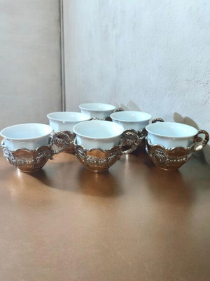 Porcelain coffee cups with silver bases like new