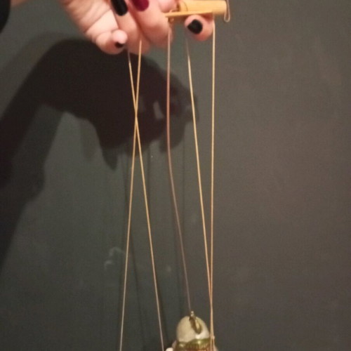 Vintage knight marionette used with broken hand