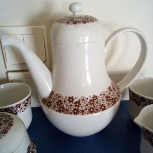 Tea set used with teapot, sugar bowl, creamer and two cups Ionian porcelain