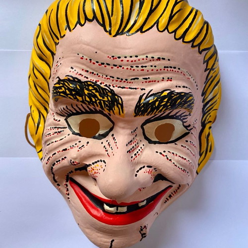 Vintage carnival mask used, plastic