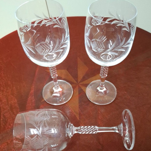 Crystal glasses like new, set of 3, engraved with designs