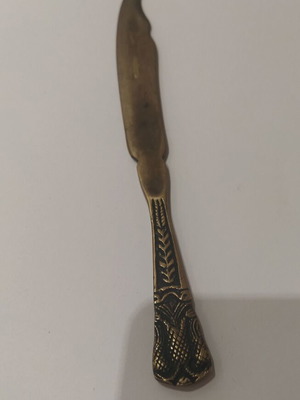 Vintage knife bronze with embossed designs, like new