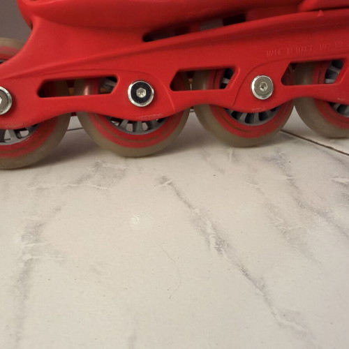 Roxa Beetle Inline Skate Junior like new, adjustable size, red