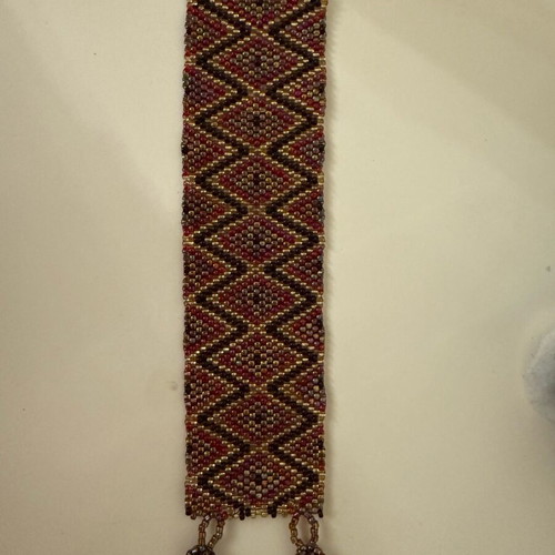 Handmade bead weaving bracelet like new, geometric design