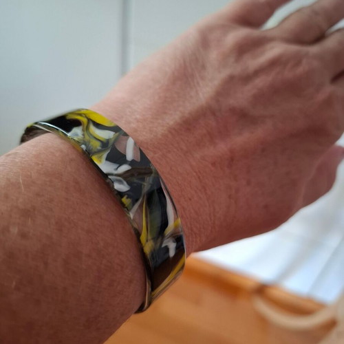Plastic bracelet like bone colored like new