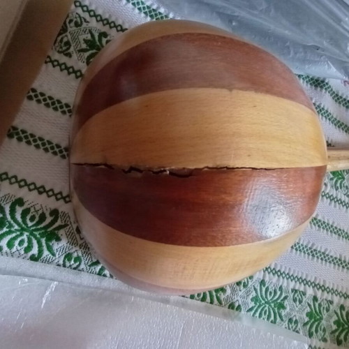 Mini tambouras used, wooden with crack