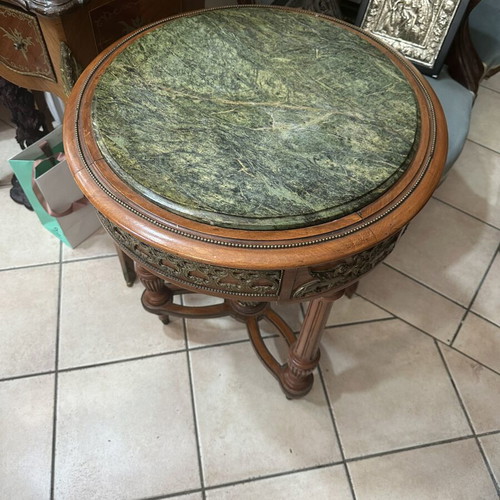 Table with bronze details and marble top used