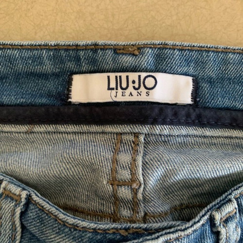 Blue skinny jeans like new with hearts, size XS