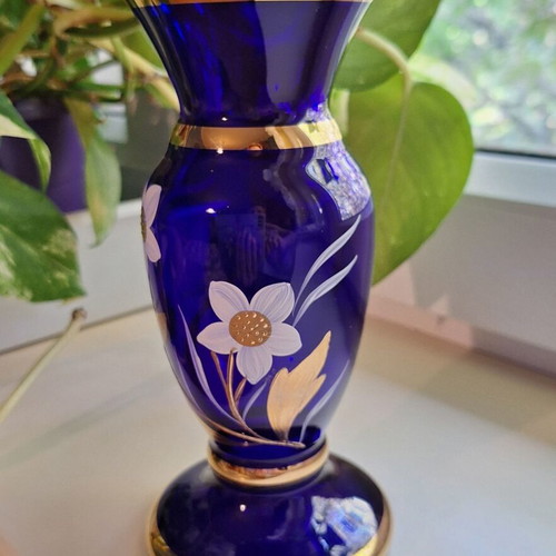 Blue vase with gold ornaments like new, solid glass