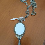 Necklace with mirror used