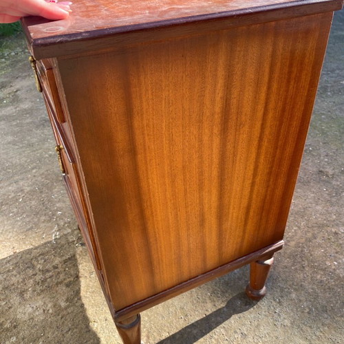 Wooden bedside cabinet used with drawer and cupboard
