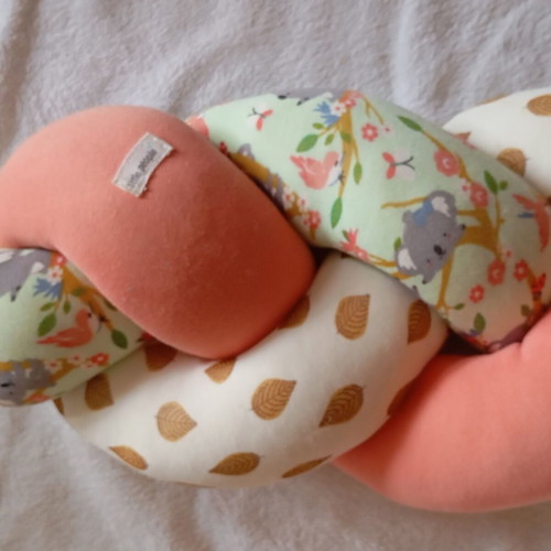 Braided bumper for baby crib like new with leaves and koala