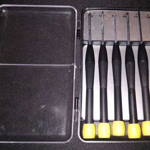 Set of small precision screwdrivers like new in case