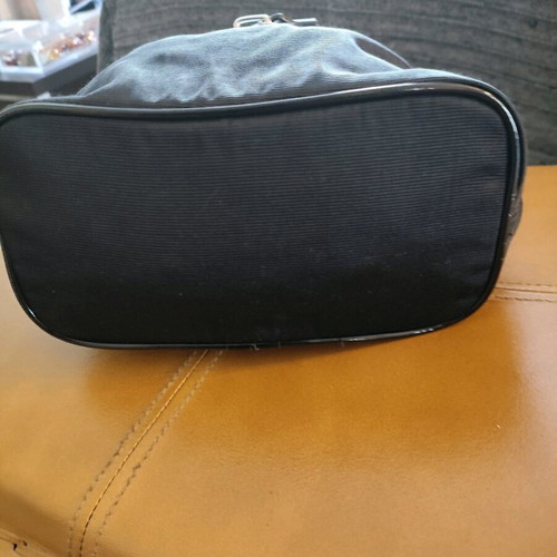 Dior small black hand bag like new with silver details