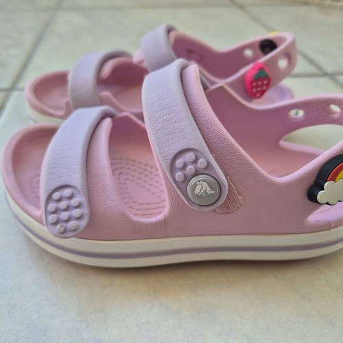 Crocs pink sandals with 3 charms, size C9