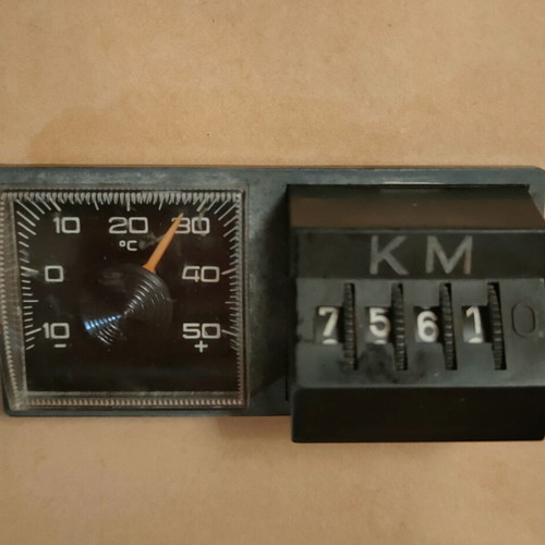 Vintage odometer and thermometer used with magnet