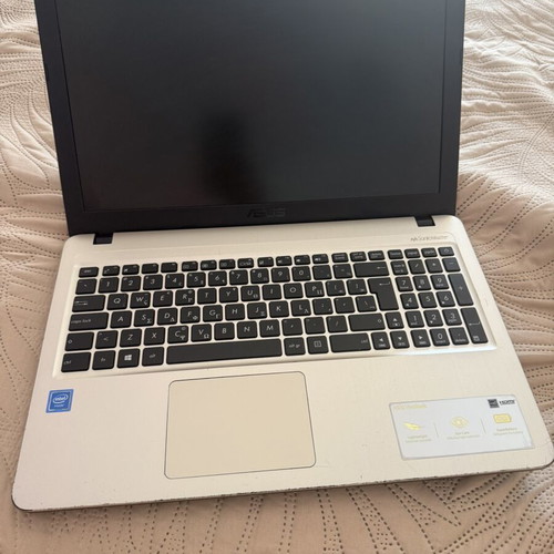 Asus VivoBook laptop with new charger, 15-inch, Intel Celeron, 4GB RAM