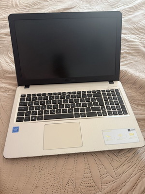 Asus VivoBook laptop with new charger, 15-inch, Intel Celeron, 4GB RAM