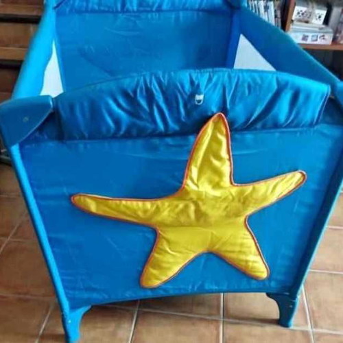 Agatha Ruiz De La Prada baby crib used, blue with yellow star pockets