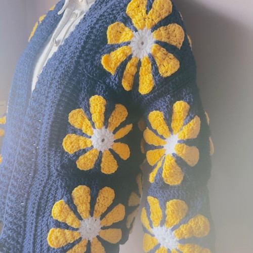 Handmade crochet cardigan made to order with daisies in blue and yellow