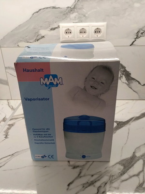 MAM steam sterilizer like new, capacity for 9 bottles