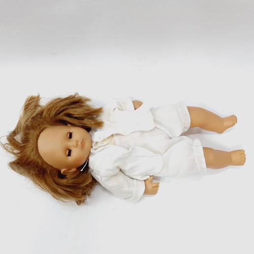 Vintage hard plastic doll with blue sleeping eyes, 1970s