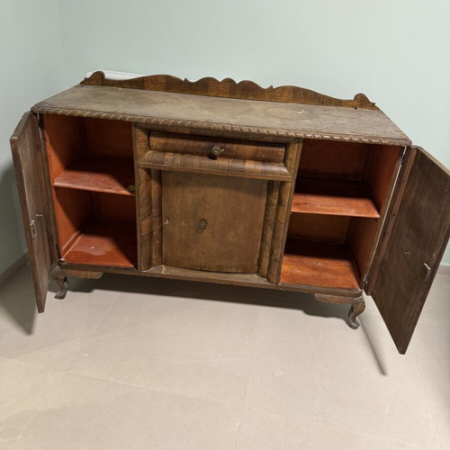 Vintage wooden buffet with carved details