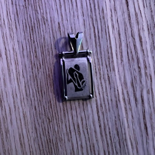 Silver Aquarius Zodiac Pendant rectangular, like new