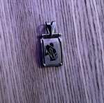 Silver Aquarius Zodiac Pendant rectangular, like new
