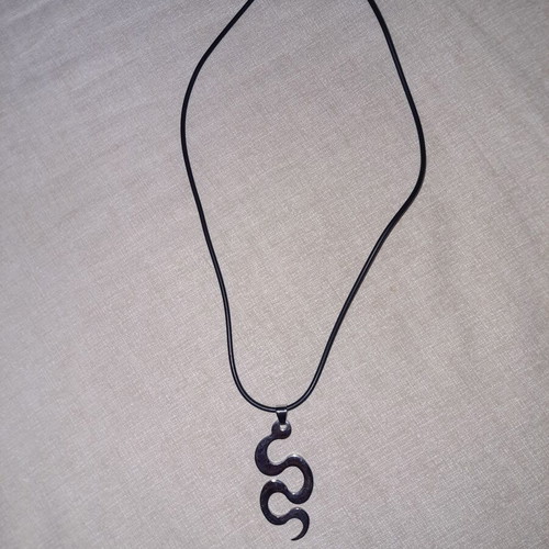 Pendant stainless steel snake with rubber cord like new, black and silver
