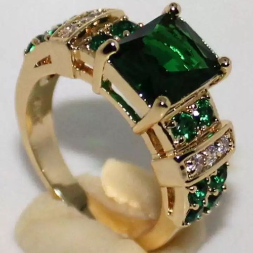 Ring with emeralds and crystals, new, gold plated