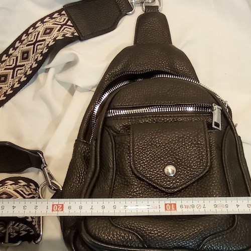 Black Sling Bag Crossbody backpack like new with wide strap and multiple pockets