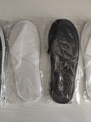 Set of 4 hotel spa slippers new, 2 black and 2 white