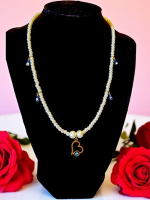 Handmade necklace with white pearls, gold heart with eye and small eyes