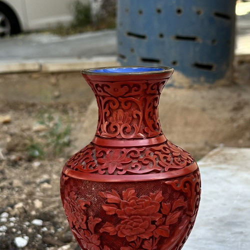 Vintage red carved vase with embossed flowers used, 19cm
