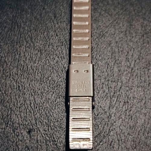 Lorus vintage women's quartz watch with embossed silver bracelet