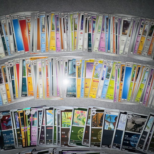 Pokemon bulk cards set with 125 non-foil and 58 foil cards