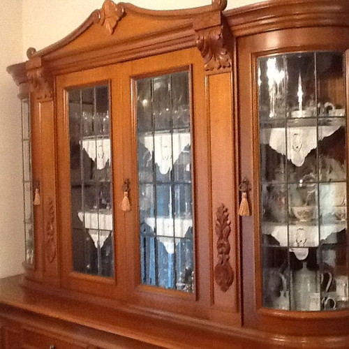 Handmade walnut display cabinet like new with crystal doors