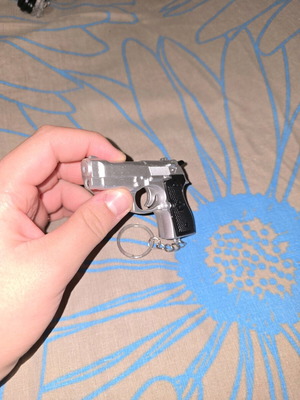 Lazer flashlight keychain in gun shape like new