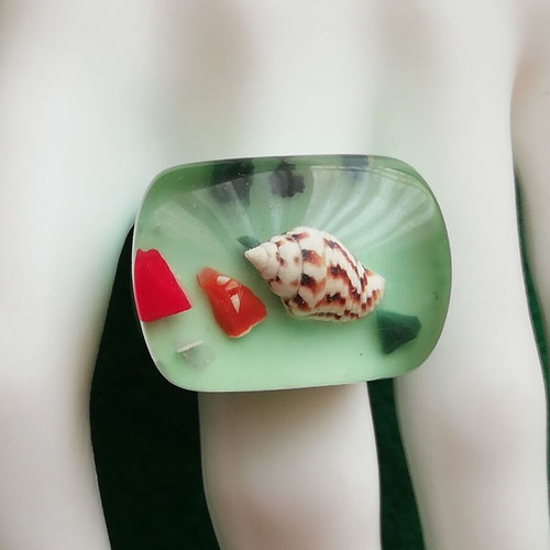 Blown glass ring with shell in transparent green color new