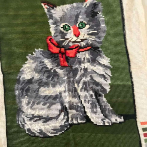 Handmade framed textile painting used with green background