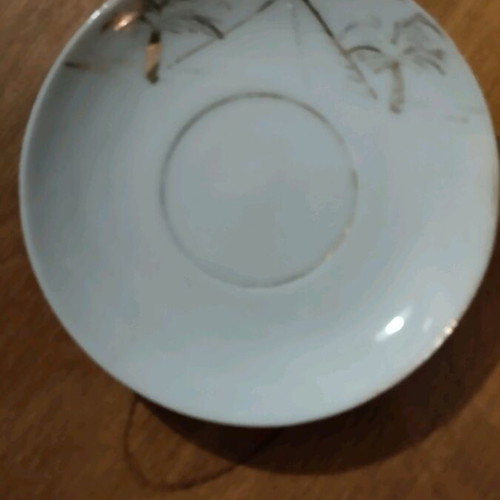 Collectible old coffee cup used from Japan with saucer