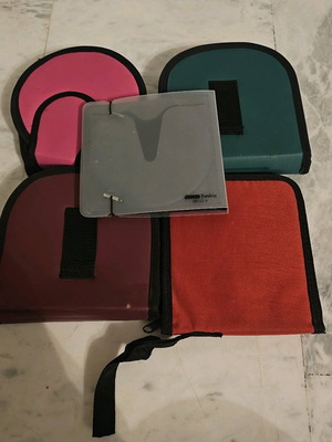 Set of 5 used colorful CD and DVD organizing cases