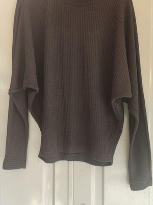 Women's black knitted blouse