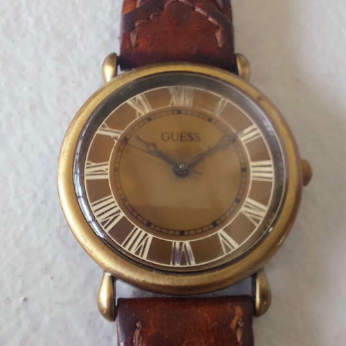 Guess women's vintage watch used with leather strap