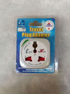 Travel plug adapter from European Schuko to UK, new, suitable for travel